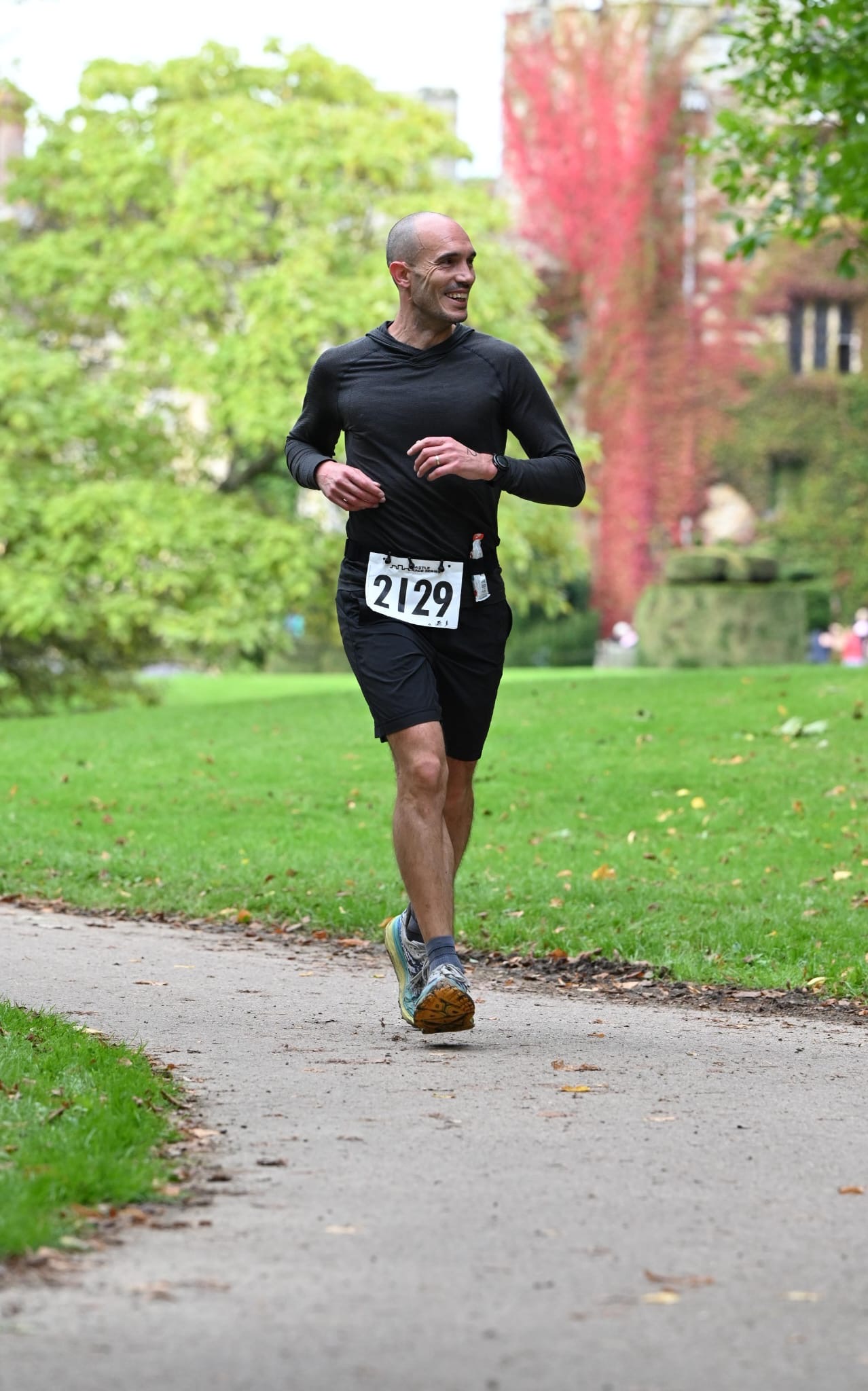 Constan, founder of PTatHome, competing in a park run